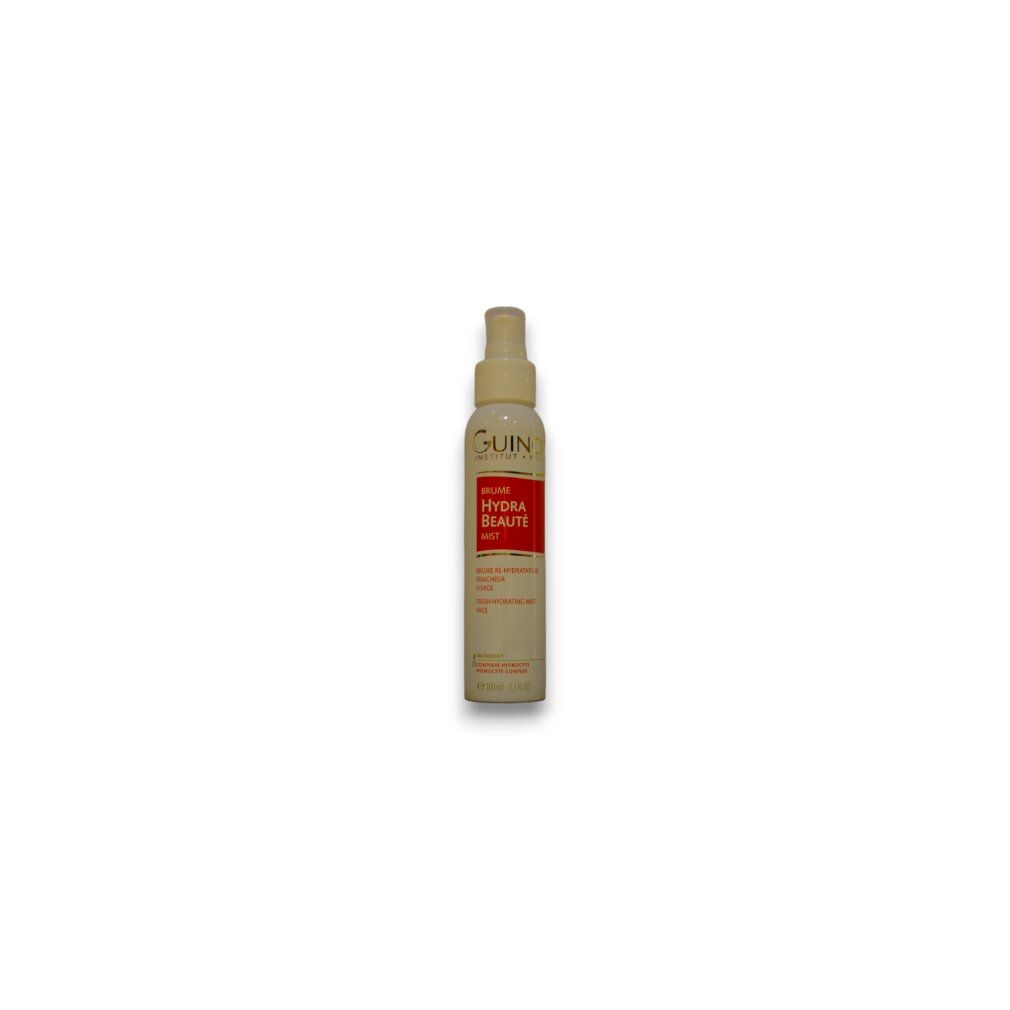 Flacone beige con vaporizzatore. Testo: HYDRA BEAUTÉ. Marchio: Guinot.