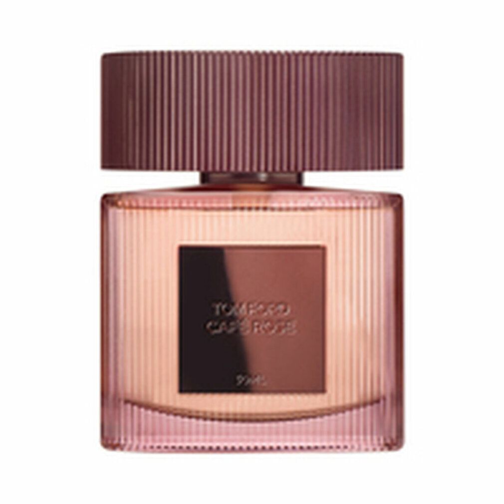 Flacone rosa con etichetta "TOM FORD Café Rose". Il flacone ha un tappo marrone.