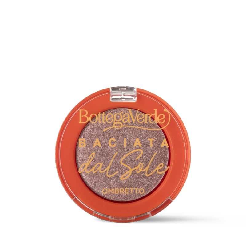 Contenitore rotondo arancione per ombretto. Scritta: Bottega Verde, Baciata dal Sole, Ombretto.