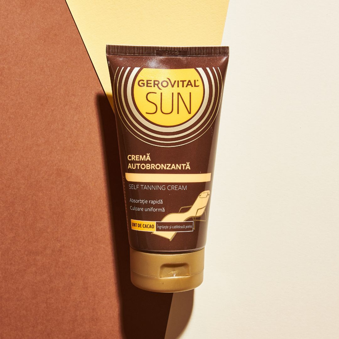 Tubo marrone con tappo dorato. Scritta: Gerovital Sun, Creme Autobronzanta, Self Tanning Cream. Sfondo: marrone e giallo.
