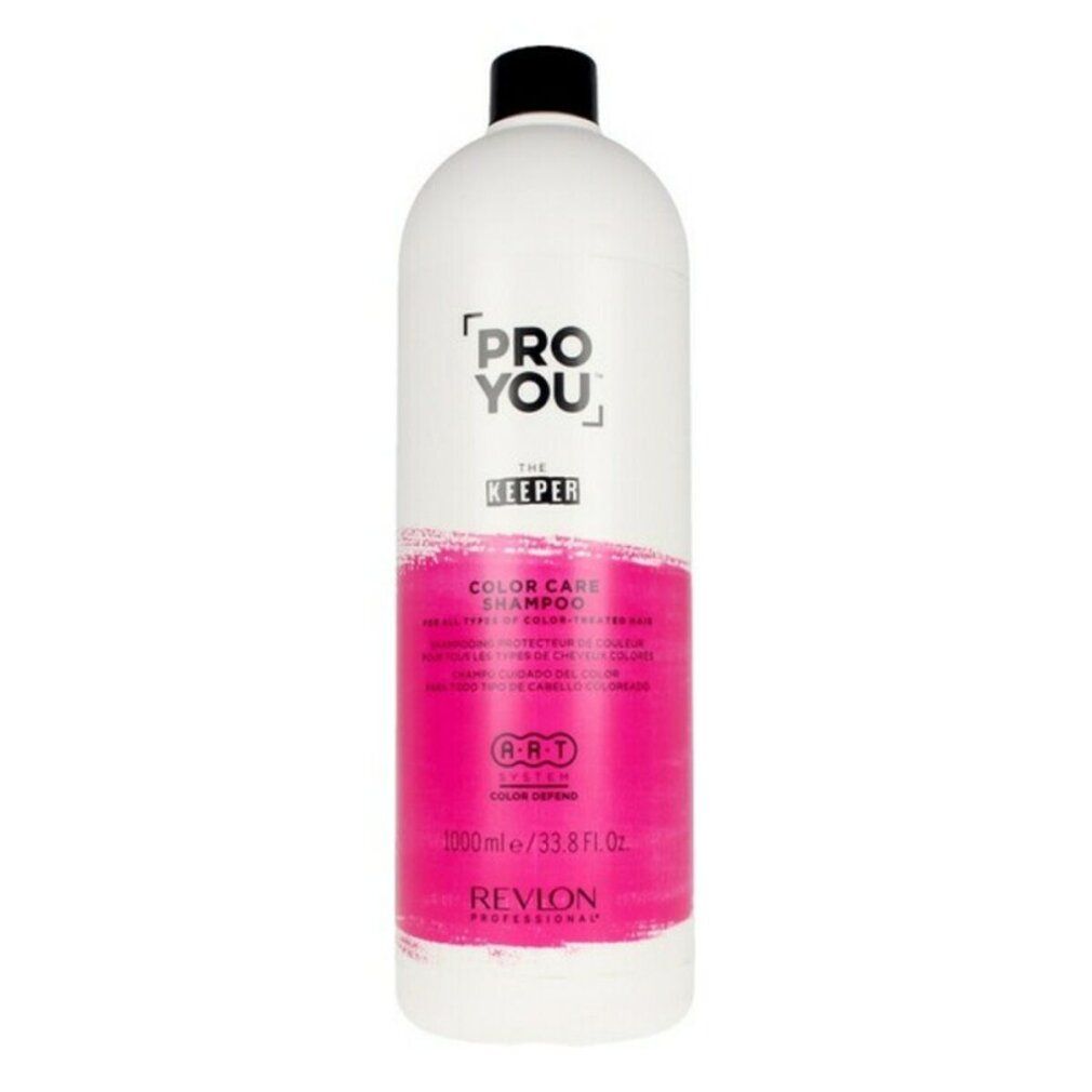 Flacone di shampoo bianco con tappo nero. Etichetta rosa con testo: PRO YOU THE KEEPER COLOR CARE SHAMPOO. Marchio: Revlon.