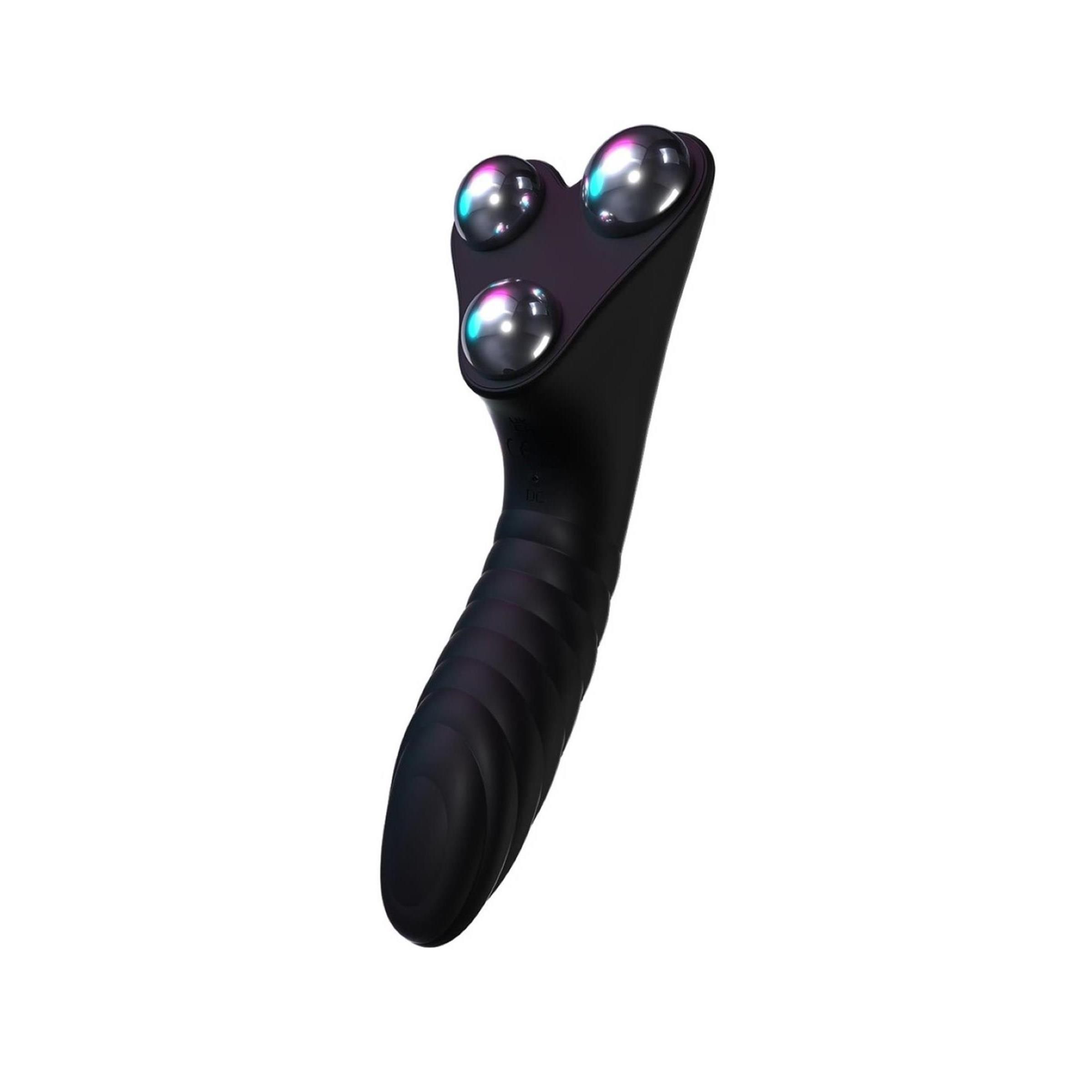 Vibratore nero con superficie scanalata e tre sfere metalliche. Design ergonomico.