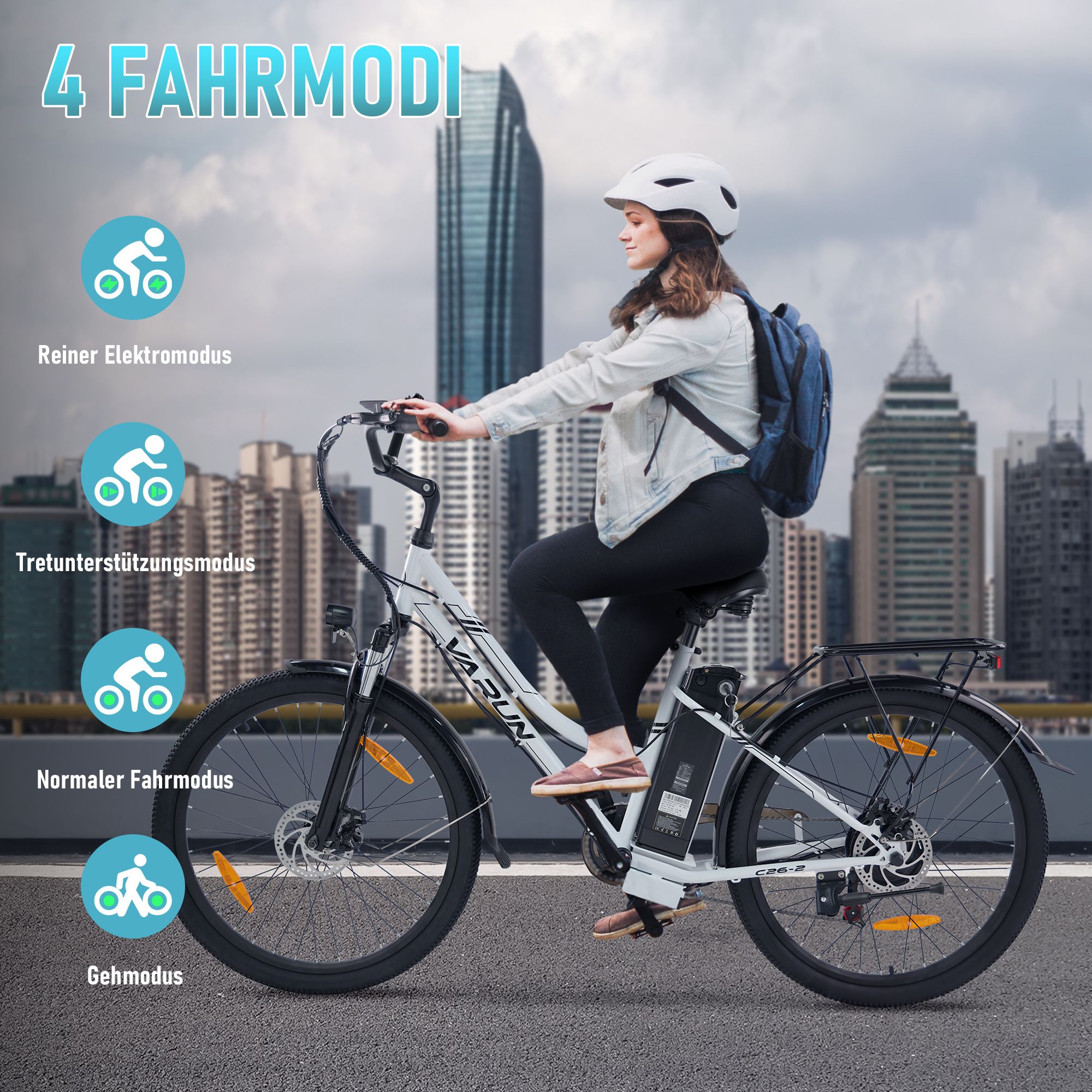E-bike VARUN C26-2 bianca. Donna che guida sulla strada. 4 modalità: elettrica pura, pedalata assistita, normale, camminata.
