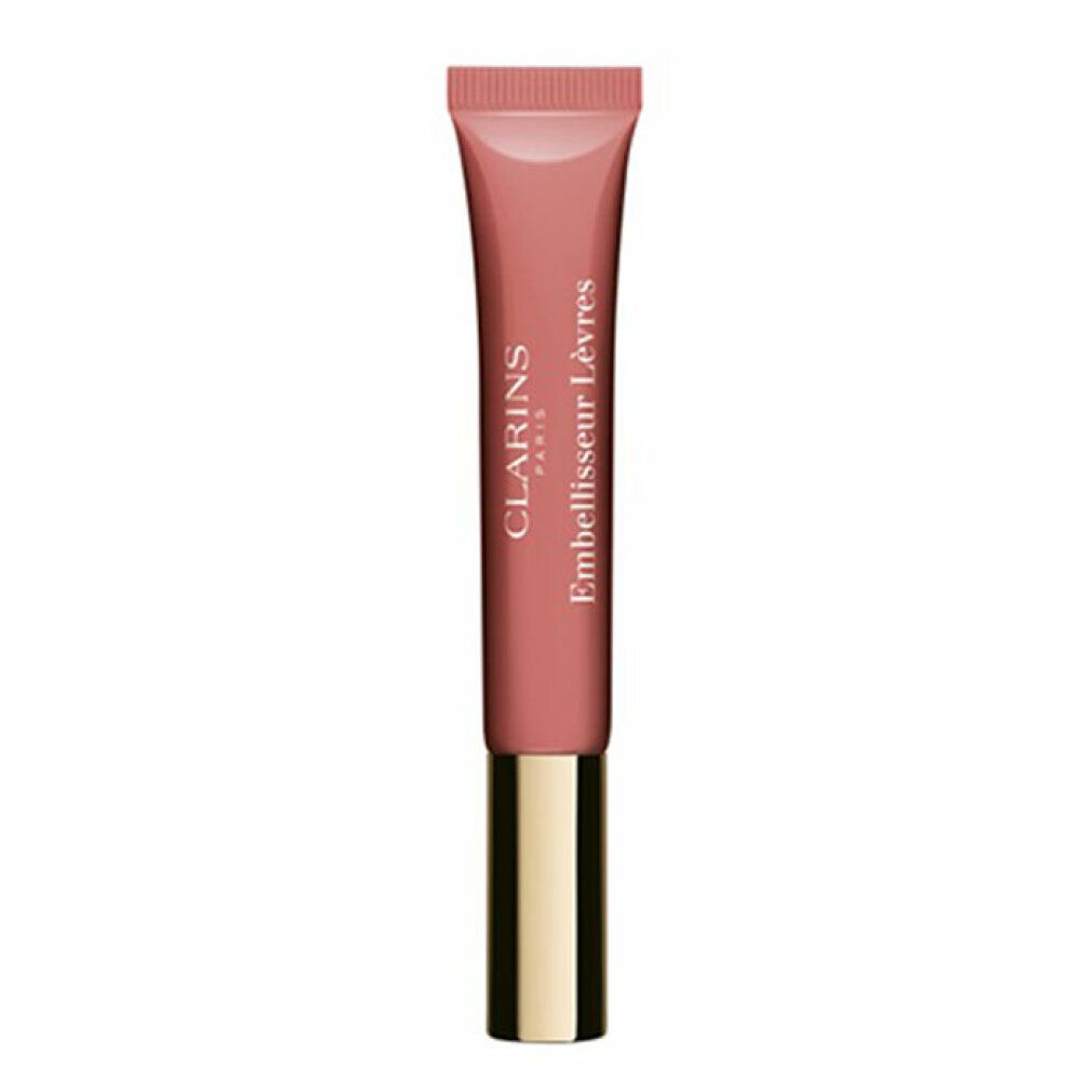 Tubo di balsamo labbra rosa. Tappo dorato. Scritta: Clarins Embellisseur Lèvres.