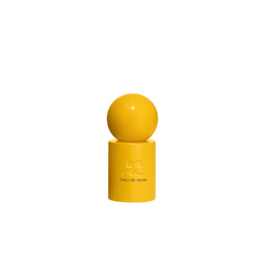 Flacone giallo con tappo sferico. Scritta: AC, l'Eau de Liesse Eau de Parfum.