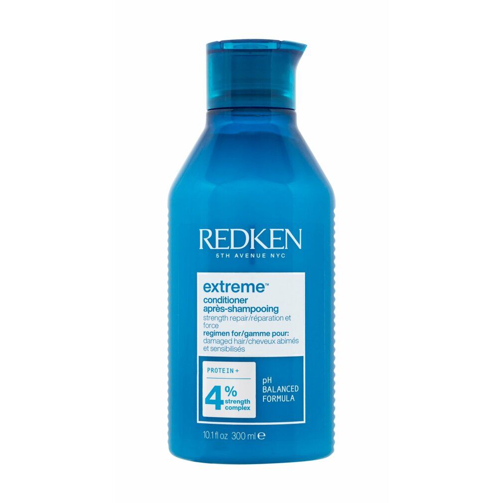 Flacone blu di Redken Extreme Conditioner. Contiene 300 ml. Scritta: Extreme, pH Balanced Formula, 4% Strength Complex.