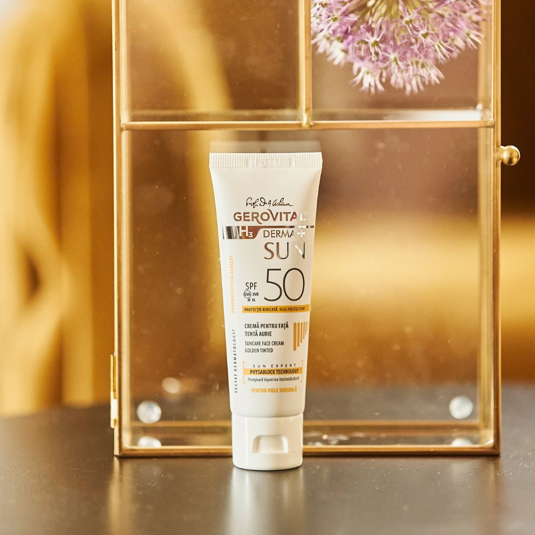 Tubo di crema solare bianca. Scritta: Gerovital H3 Derma+ Sun, SPF 50. Crema viso colorata.