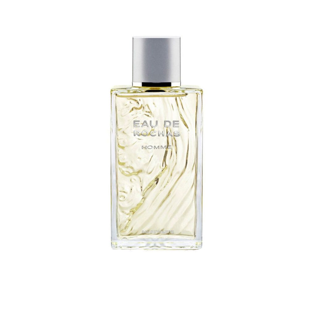 Flacone quadrato con tappo argentato. Scritta: Eau de Rochas Homme Eau de Toilette. Design inciso.