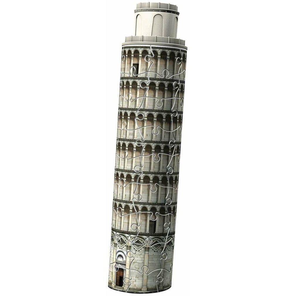Torre Pendente di Pisa assemblata. Mattoni grigi, cima bianca. Singoli pezzi del puzzle visibili.