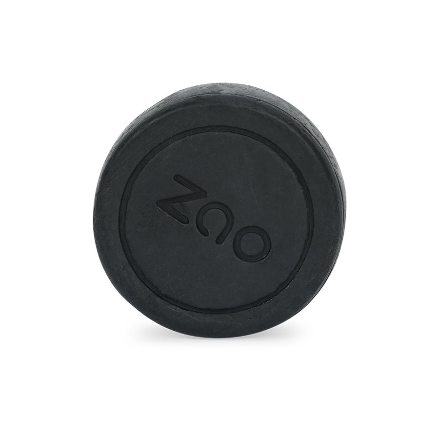 Sapone viso ZAO nero, rotondo. Logo in rilievo. Bordi scanalati.