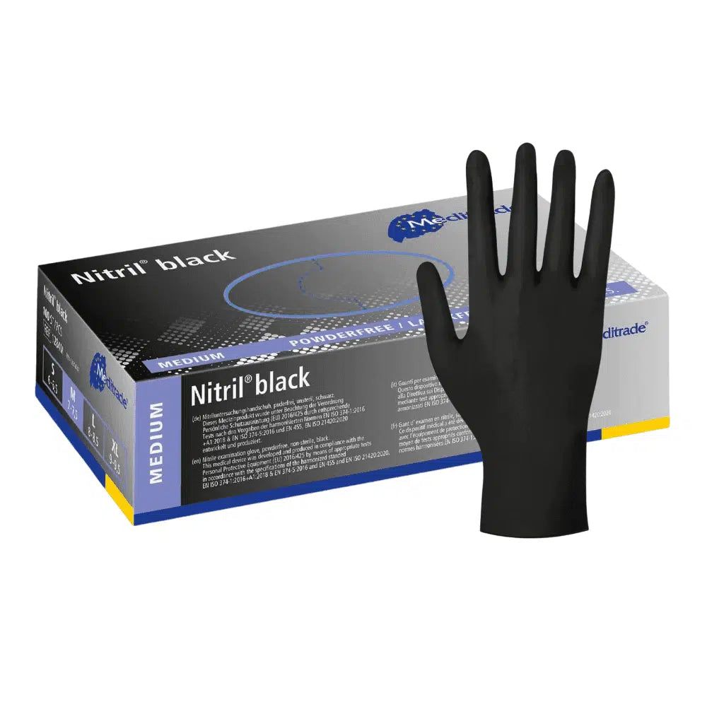 Guanto in nitrile nero accanto a una scatola. La scatola indica "Nitril black" e "powderfree".