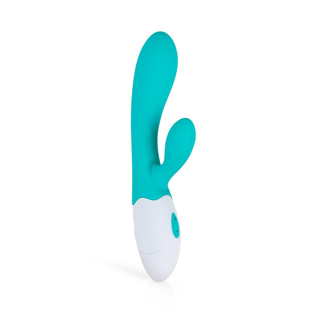 Vibratore turchese e bianco, forma curva con due sporgenze. Pannello di controllo con pulsanti.