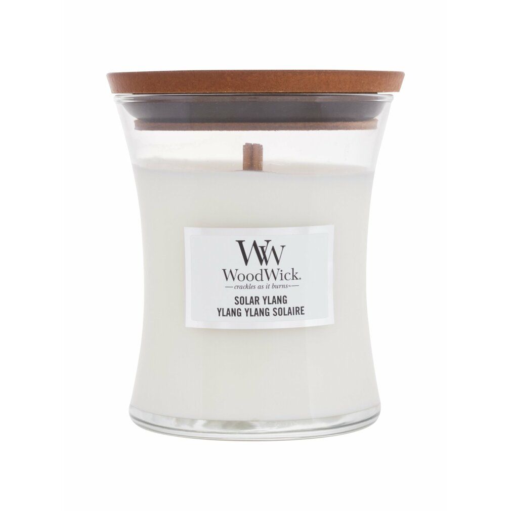 Candela a clessidra con coperchio in legno. Etichetta "WoodWick" e "Solar Ylang".