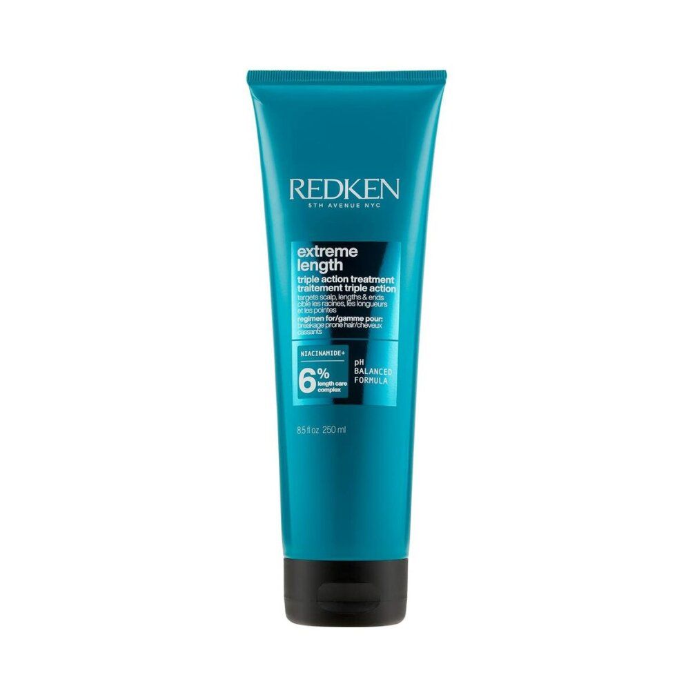 Tubo turchese. Scritta Redken Extreme Length. Tappo nero. Testo: Triple Action Treatment, 6% Length Boost.