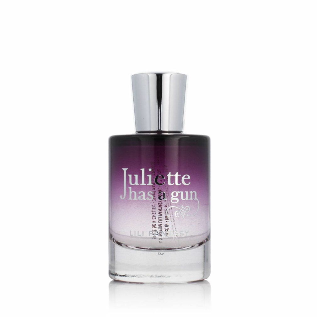 Flacone di profumo con tappo argentato. Sfumatura da viola a trasparente. Scritta: Juliette has a gun, Lili Fantasy.