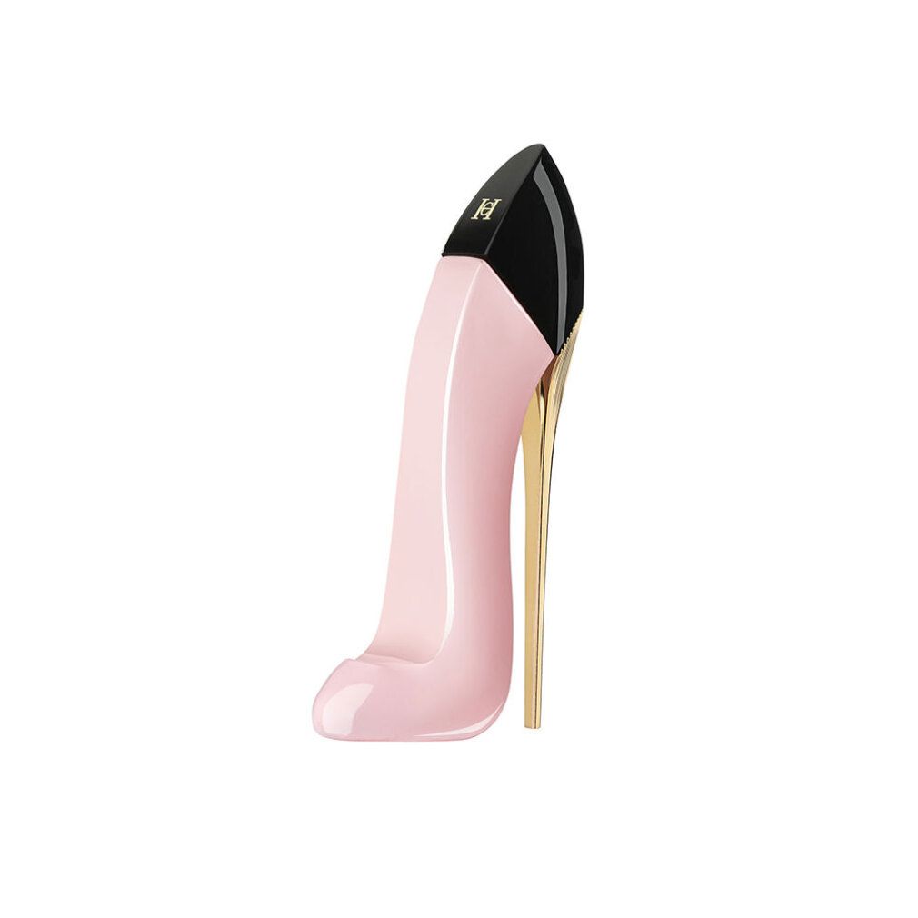 Flacone di profumo a forma di décolleté rosa con tacco nero e stiletto dorato.