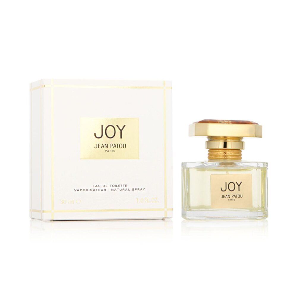 Flacone di profumo e confezione. Flacone con tappo dorato ed etichetta "JOY JEAN PATOU PARIS". Confezione con logo.