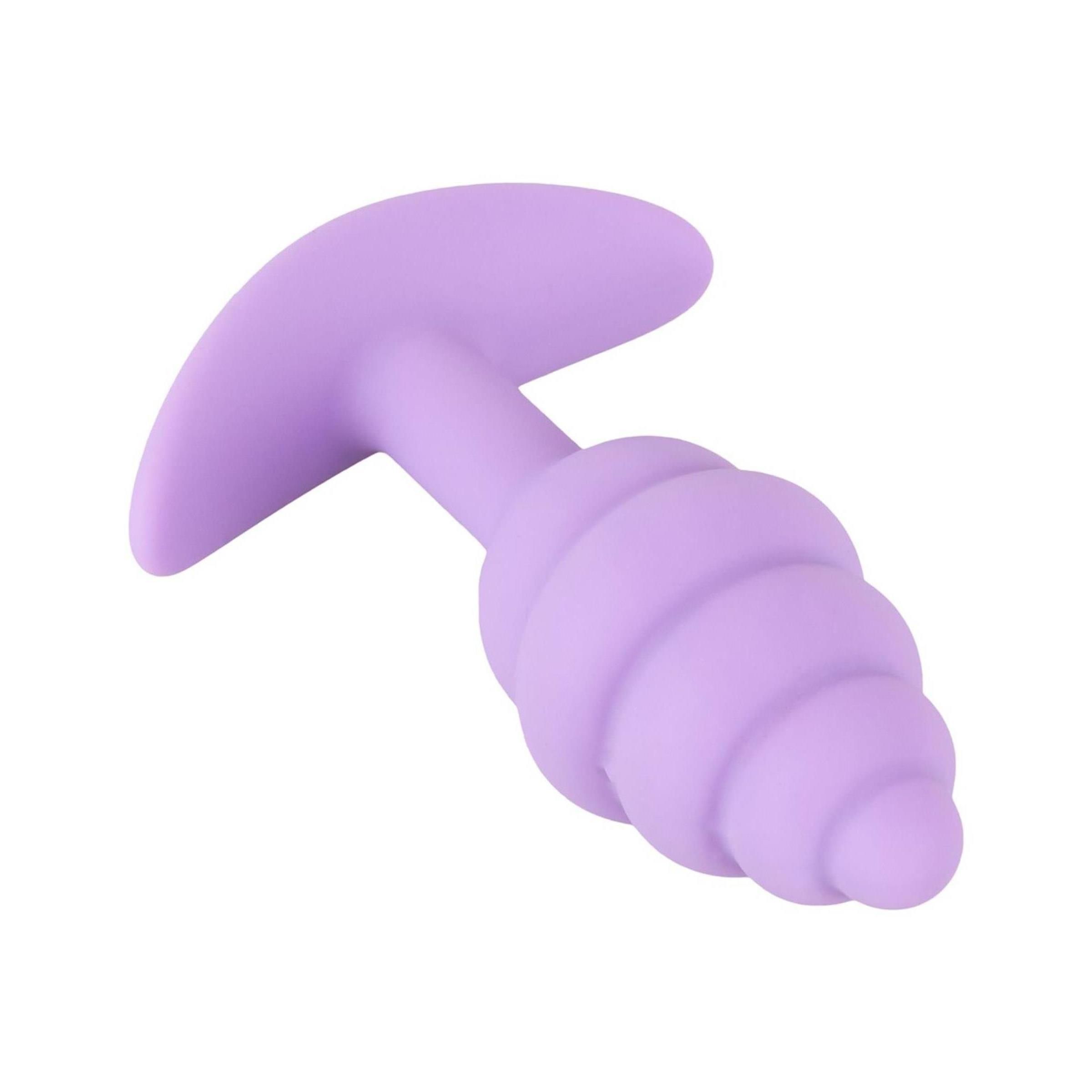 Plug anale viola, punta scanalata, base a T. Realizzato in silicone.