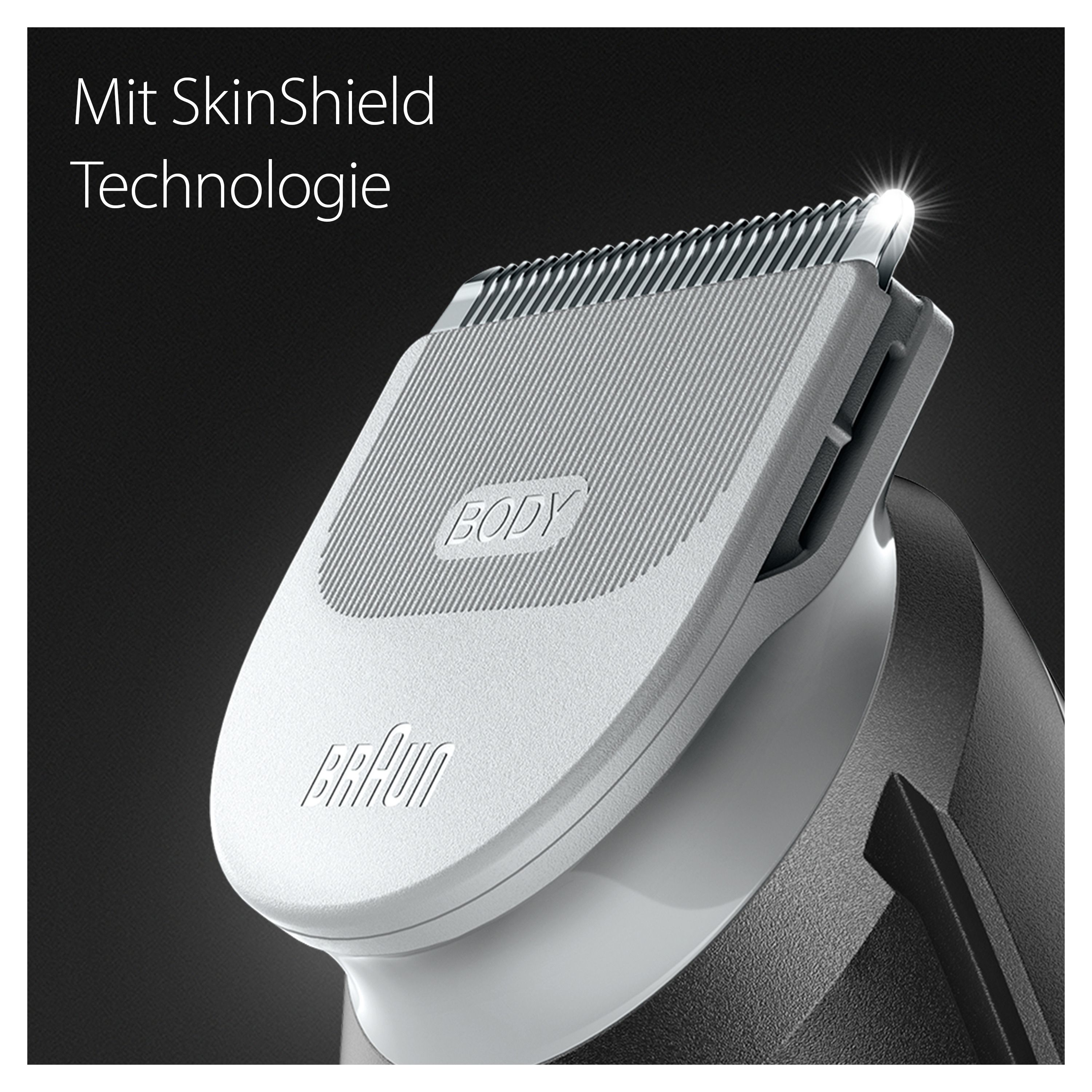 Dettaglio del rasoio Braun BodyGroomer. Testina grigia con testo: BODY. Testo: Mit SkinShield Technologie. Primo piano.