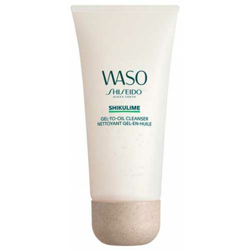 Tubo bianco con prodotto. Scritta: WASO SHIKULIME GEL-TO-OIL CLEANSER. Base beige.