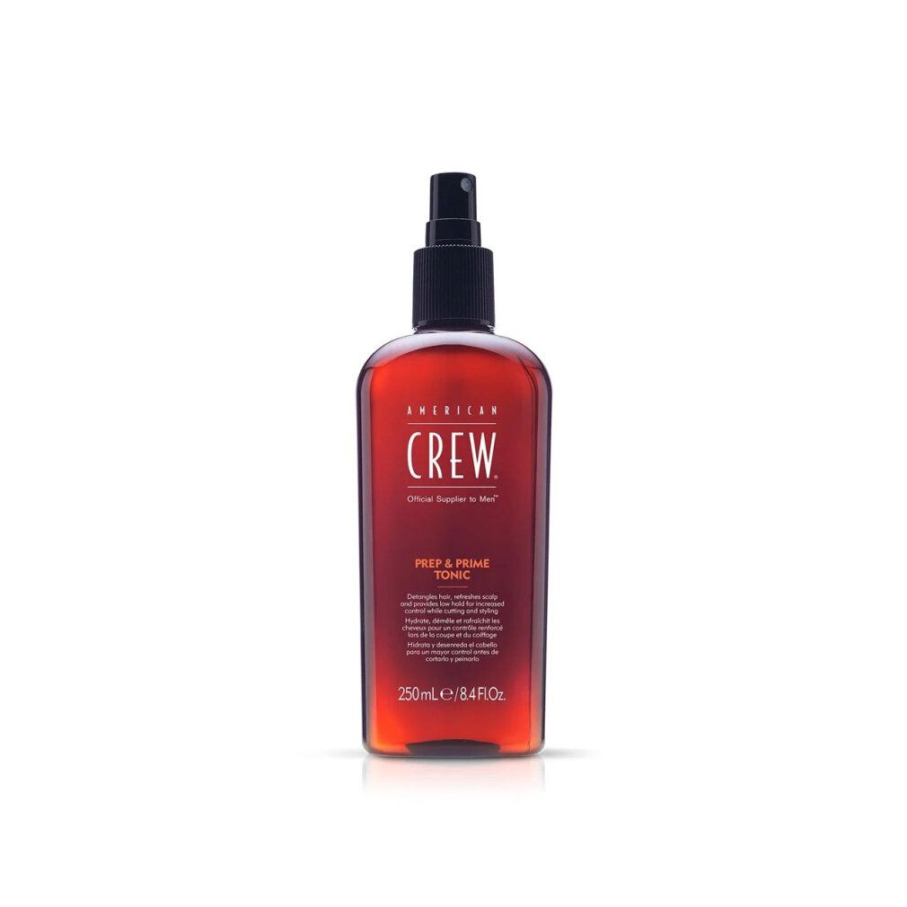 Flacone rosso con vaporizzatore nero. Scritta: American Crew, Prep & Prime Tonic. Volume: 250ml/8.4 fl oz.