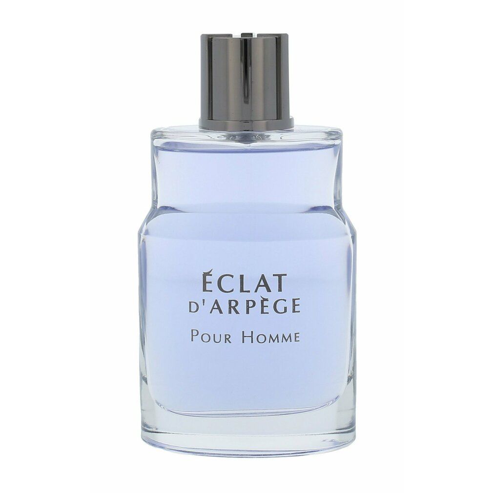 Flacone di profumo azzurro chiaro con tappo argentato. Scritta: Éclat d'Arpège Pour Homme. Flacone in vetro trasparente.