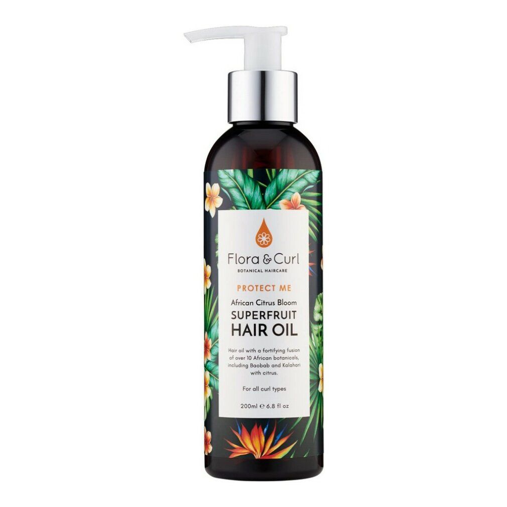 Flacone marrone con pompa. Etichetta con motivo floreale e testo: Protect Me African Citrus Superfruit Hair Oil. Per tutti i tipi di capelli.