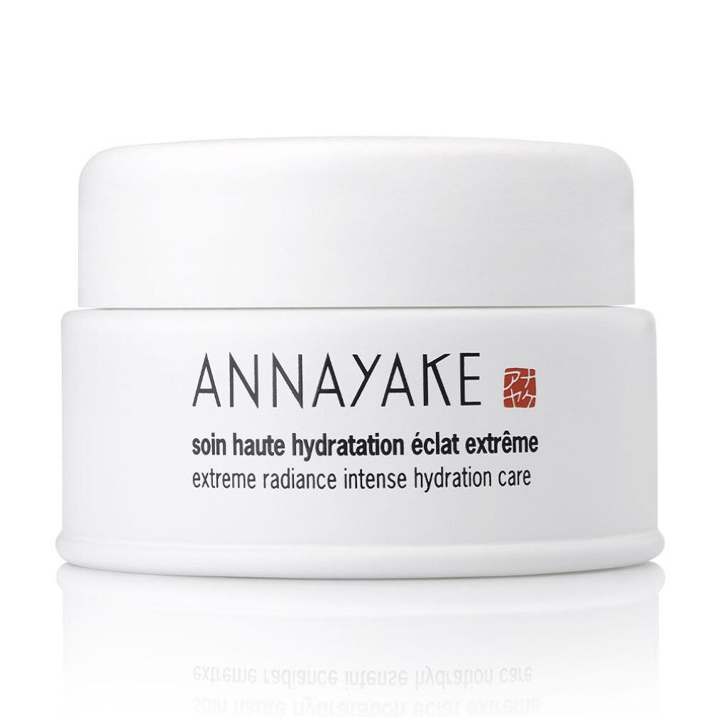 Vasetto bianco con coperchio. Scritta: ANNAYAKE, soin haute hydratation éclat extrême, extreme radiance intense hydration care.