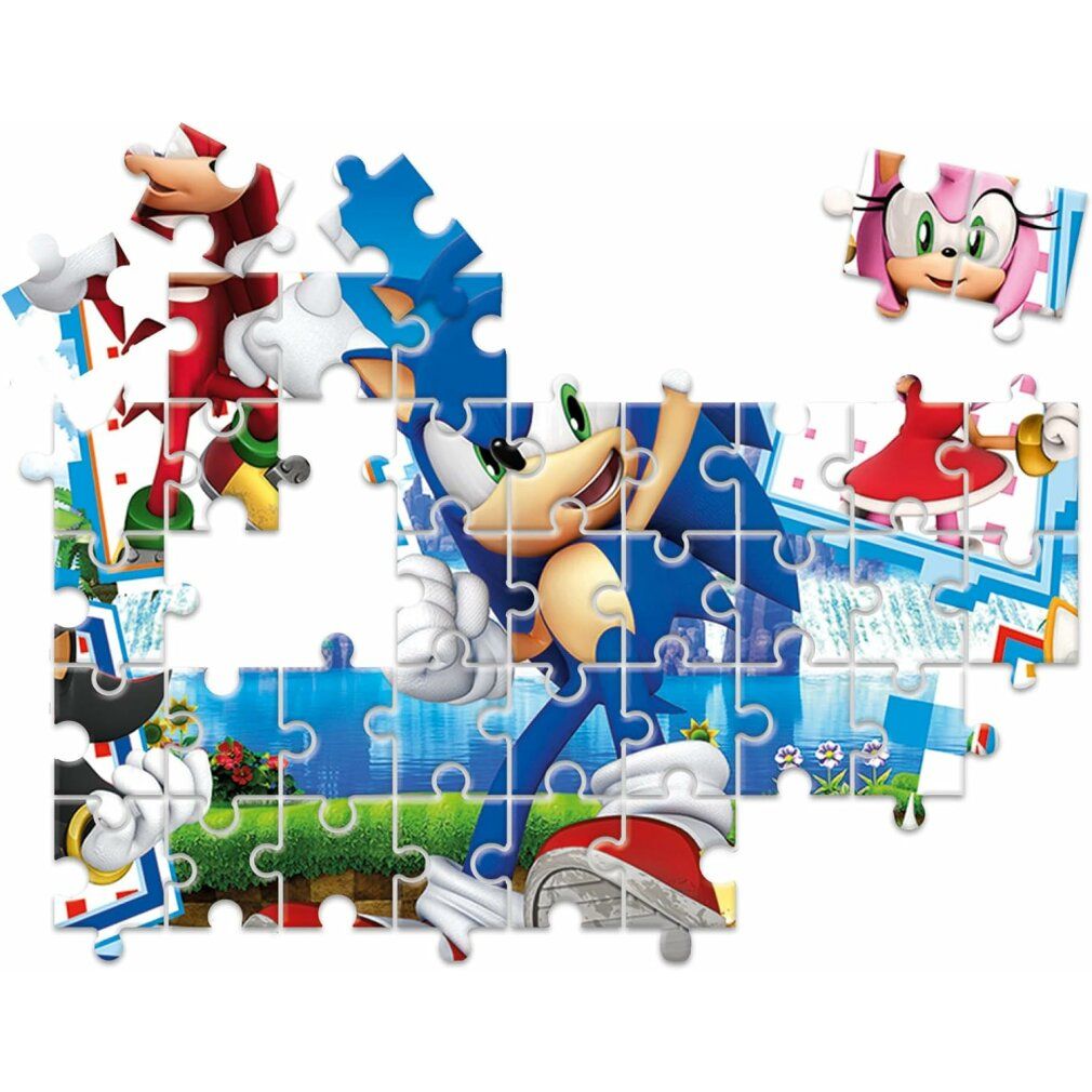 Un puzzle incompleto con motivo Sonic. Singoli pezzi di puzzle mostrano Sonic e altri personaggi in un paesaggio.