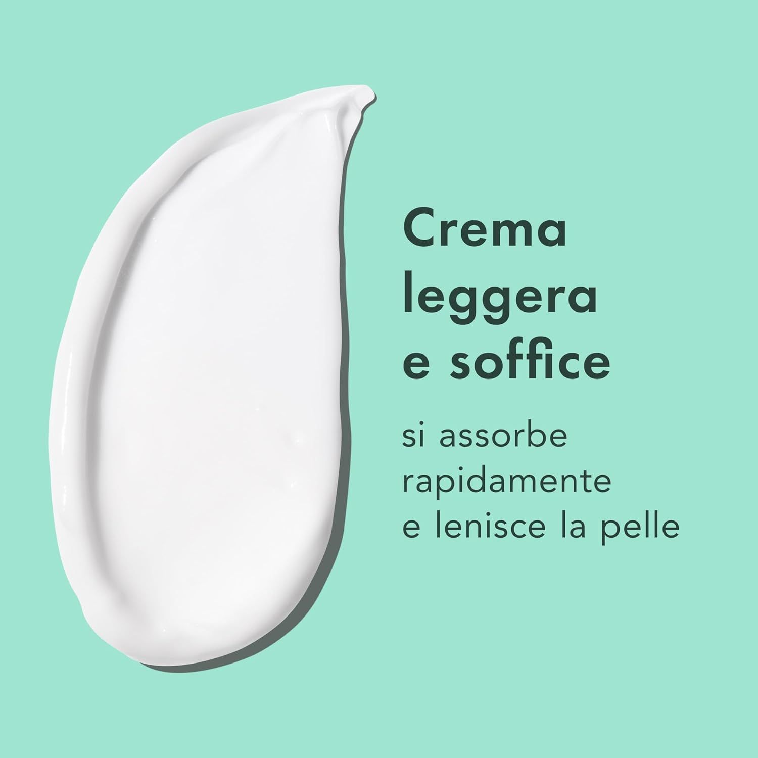 Traccia di crema bianca. Testo: Crema leggera e soffice si assorbe rapidamente e lenisce la pelle.