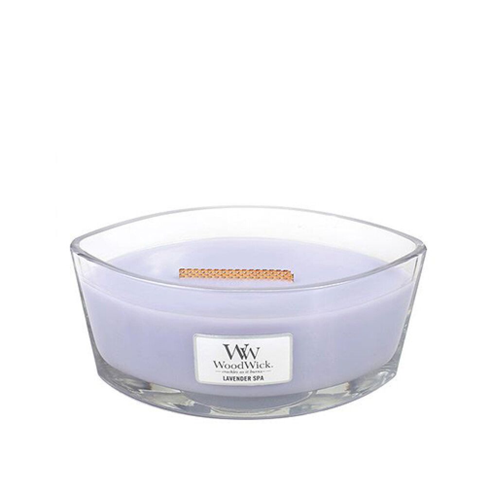 Contenitore in vetro con cera viola e stoppino in legno. Scritta: WoodWick, Lavender Spa. Forma ellittica.