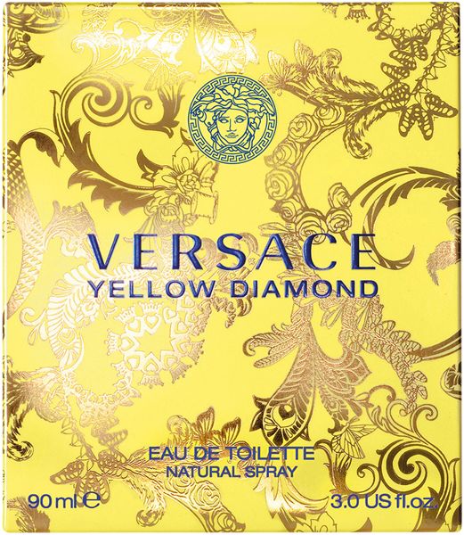 Confezione gialla Versace Yellow Diamond. Logo, scritta e motivo decorativo. Testo: Eau de Toilette.