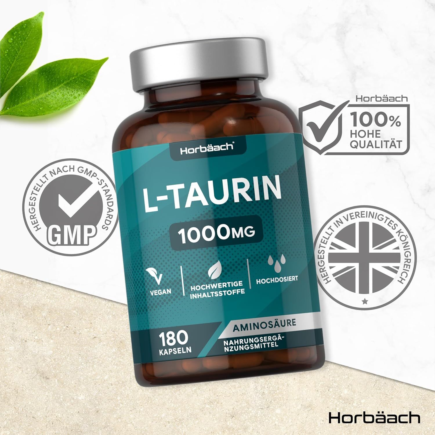 Flacone marrone con capsule. Scritta: L-TAURINA 1000mg. 180 capsule. Certificazione GMP, 100% alta qualità, prodotto nel Regno Unito.