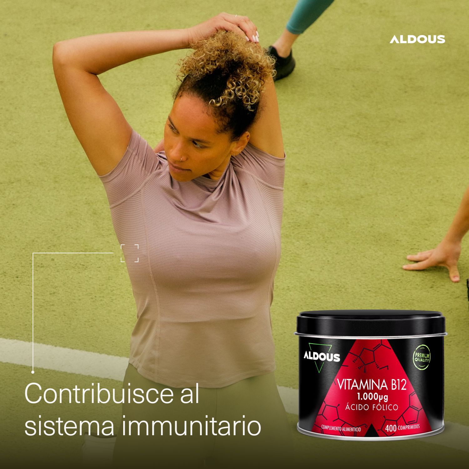 Donna si allunga, lattina Aldous Vitamina B12. Supporta il sistema immunitario.