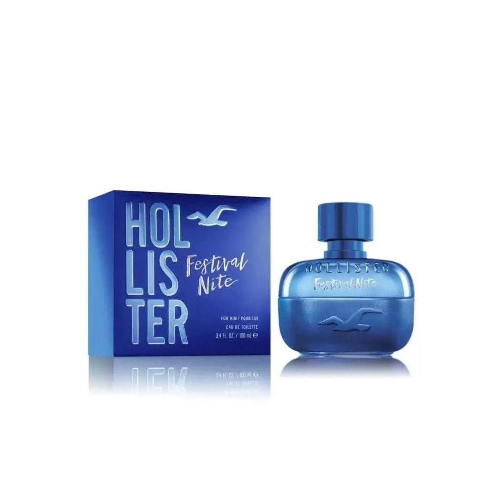 Flacone di profumo blu e scatola. Sulla scatola c'è scritto "Hollister Festival Nite". Il flacone è di forma rotonda.