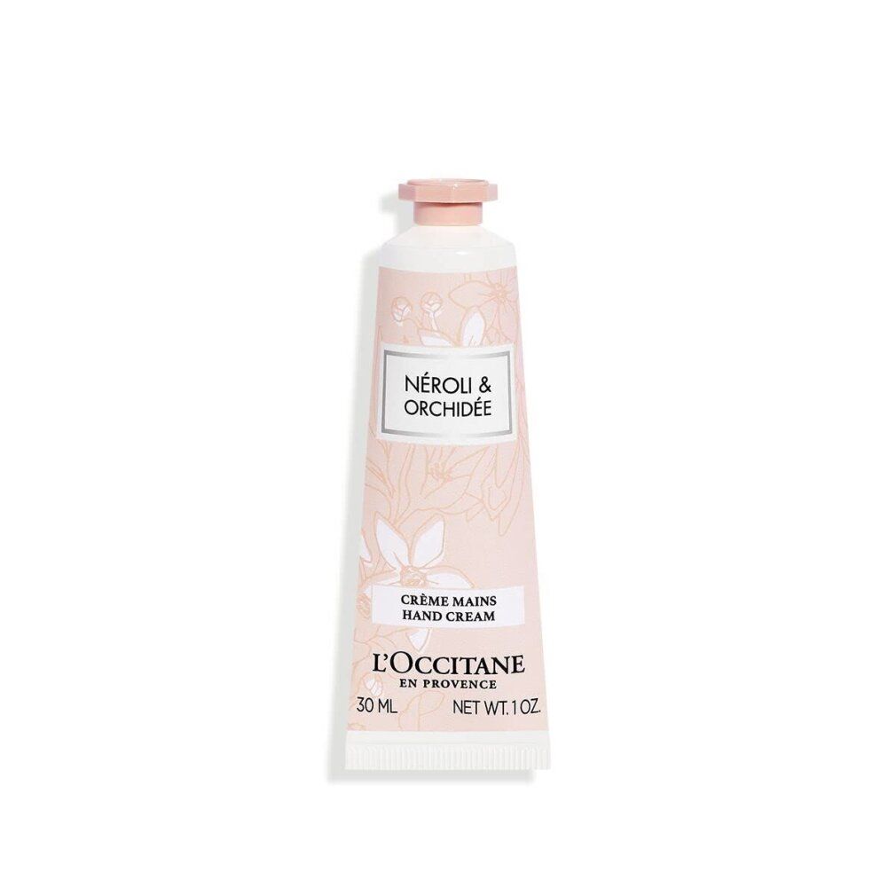Tubo rosa. L'Occitane Neroli & Orchidée. Motivo floreale. Testo: Crème Mains, Neroli & Orchidée, 30 ml, 1 oz.