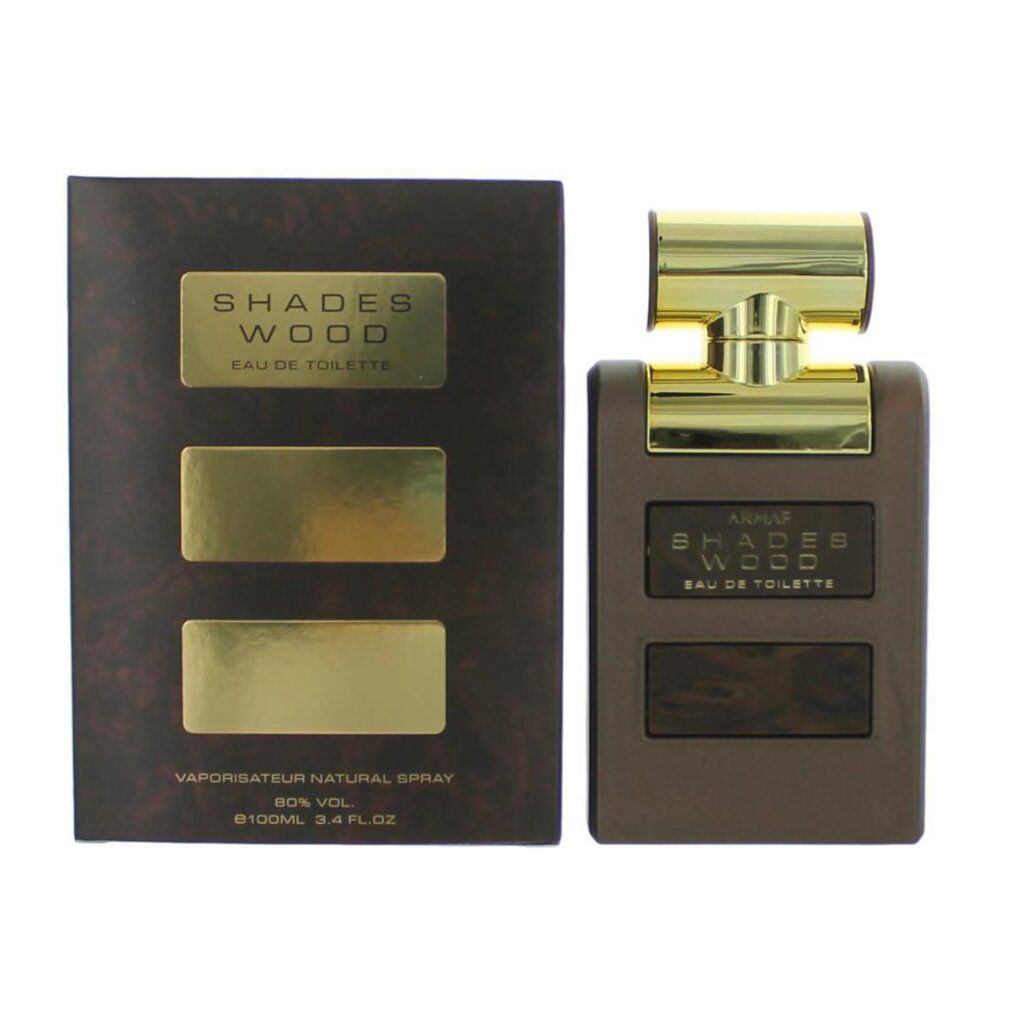 Flacone di profumo e confezione. Flacone marrone con tappo dorato. Scritta: SHADES WOOD. Confezione con rettangoli dorati.
