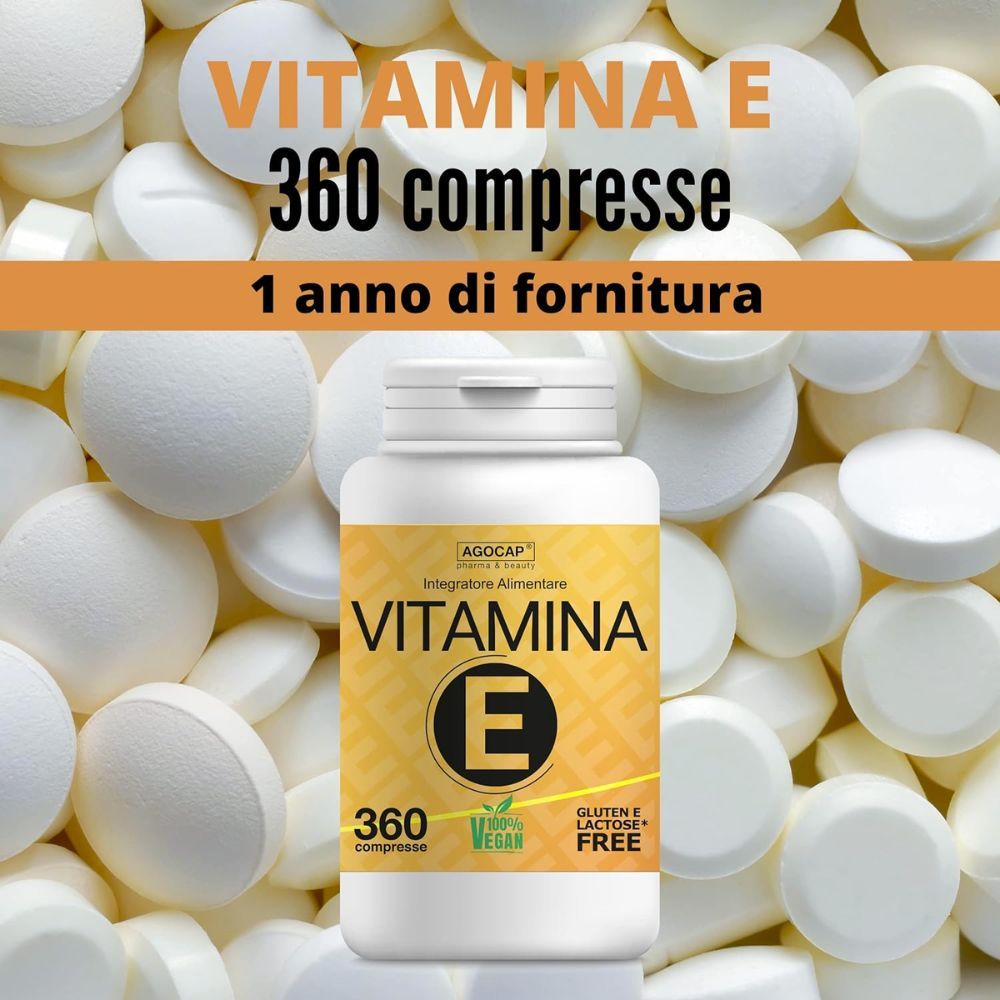Flacone con etichetta gialla, circondato da compresse. Scritta: VITAMINA E, 360 compresse, Gluten & Lactose Free, Vegan.