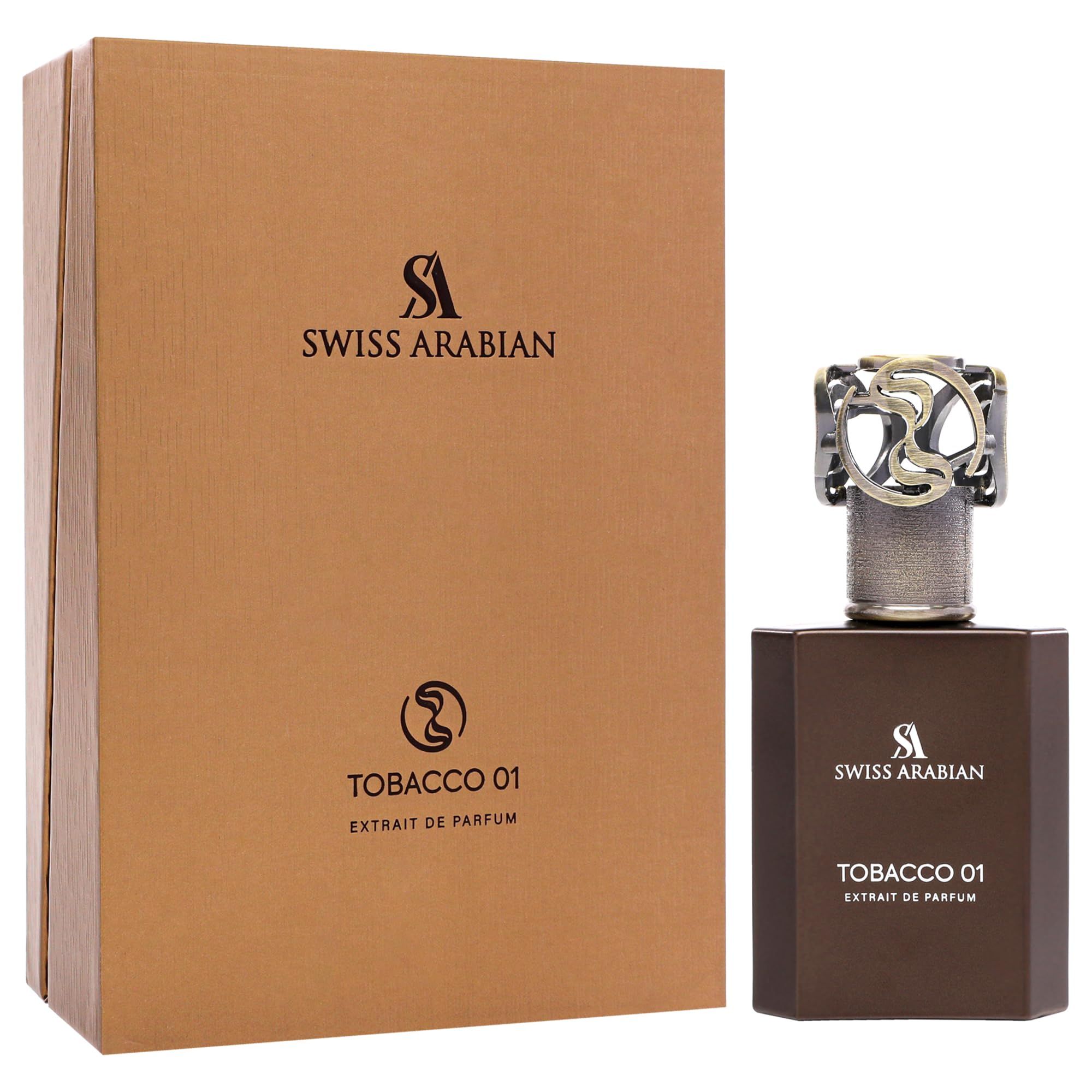 Flacone di profumo marrone e confezione. Scritta: Swiss Arabian, Tobacco 01, Extrait de Parfum. Flacone con tappo argentato.