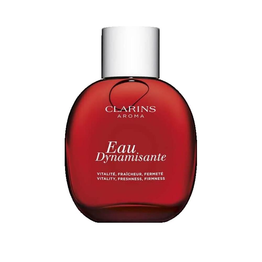 Flacone rosso con tappo bianco. Scritta: Clarins Aroma, Eau Dynamisante. Sottotitolo: Vitalité, fraîcheur, fermeté.