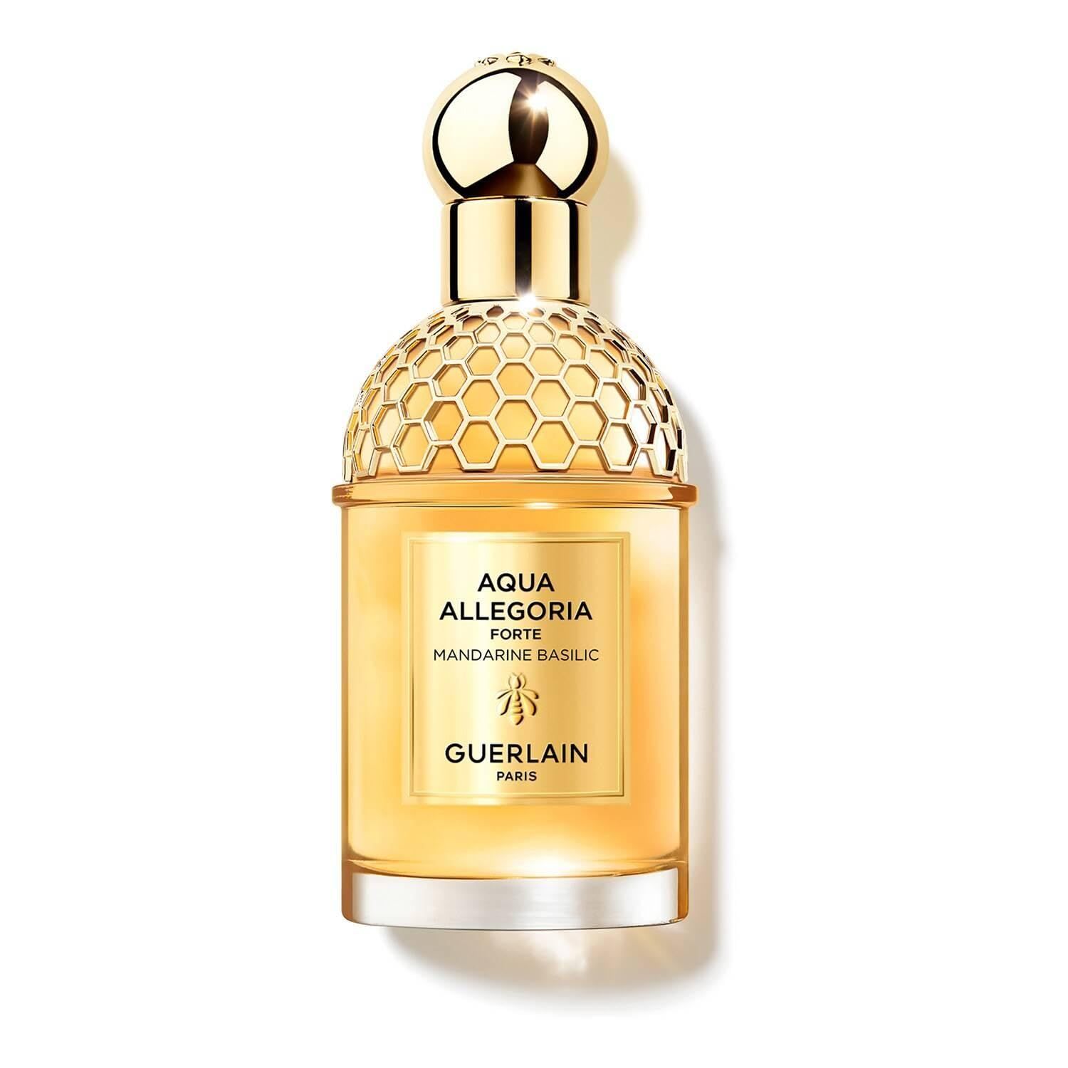 Flacone di profumo Aqua Allegoria Forte Mandarine Basilic. Tappo dorato, motivo a nido d'ape. Scritta: Guerlain Paris.