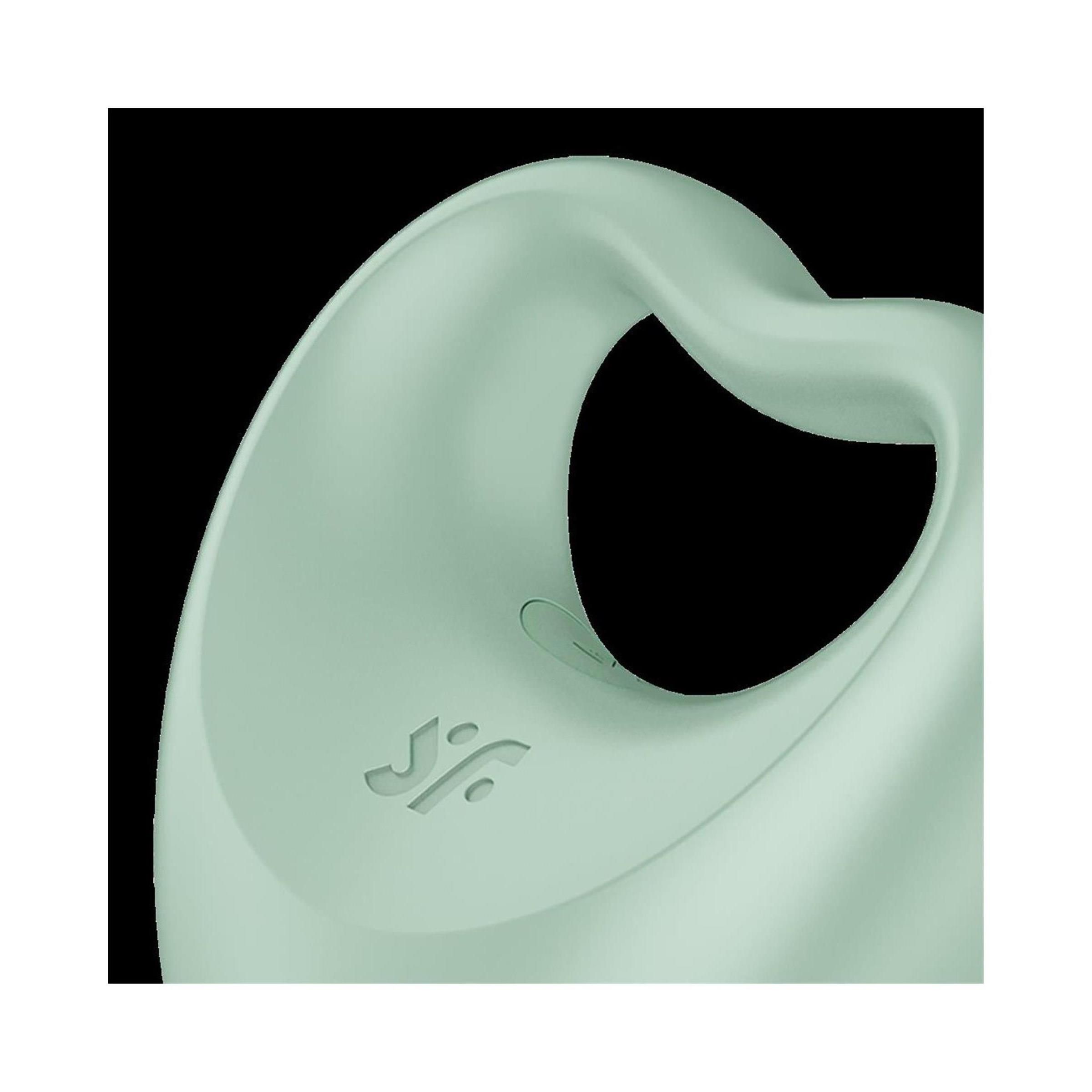 Primo piano dell'anello per il pene con vibratore per dita. Menta, a forma di cuore. Logo del produttore.