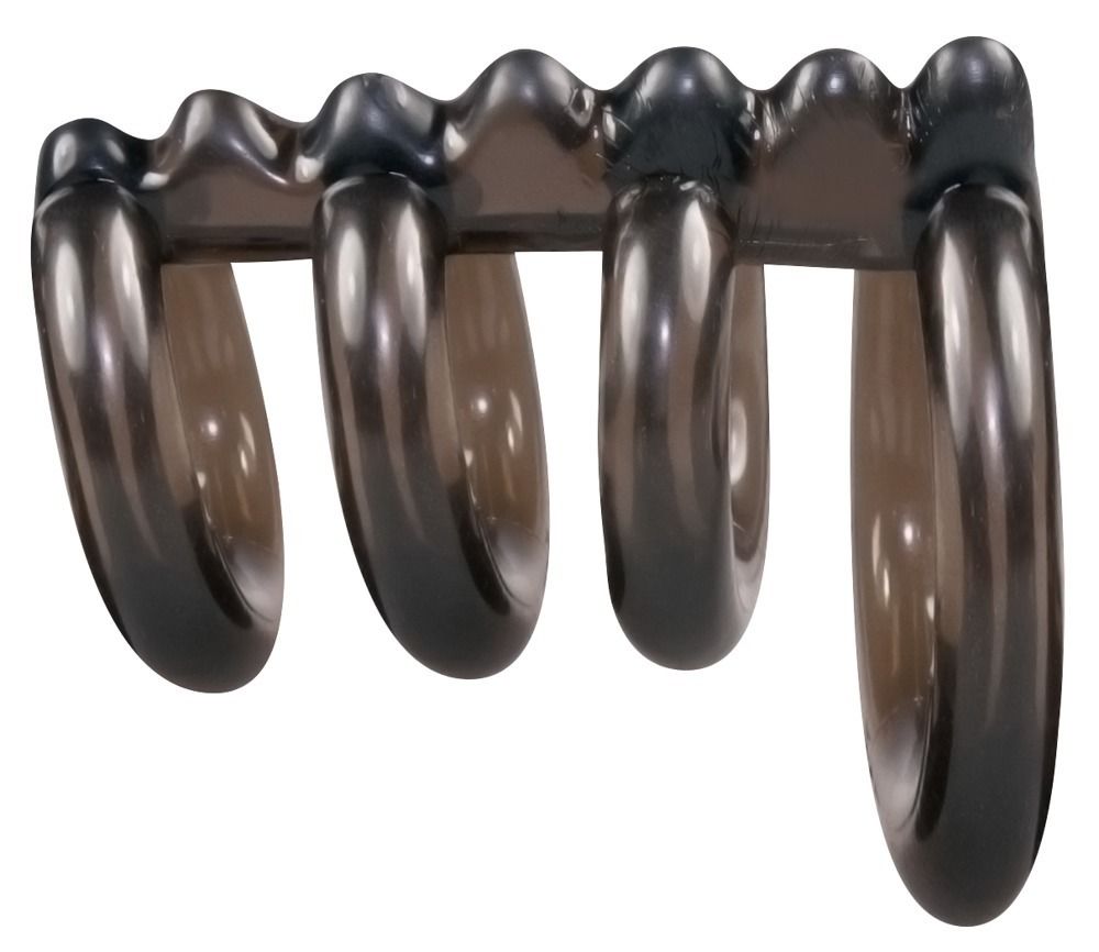 Anello per pene nero con quattro anelli e barra ondulata. Realizzato in materiale trasparente.