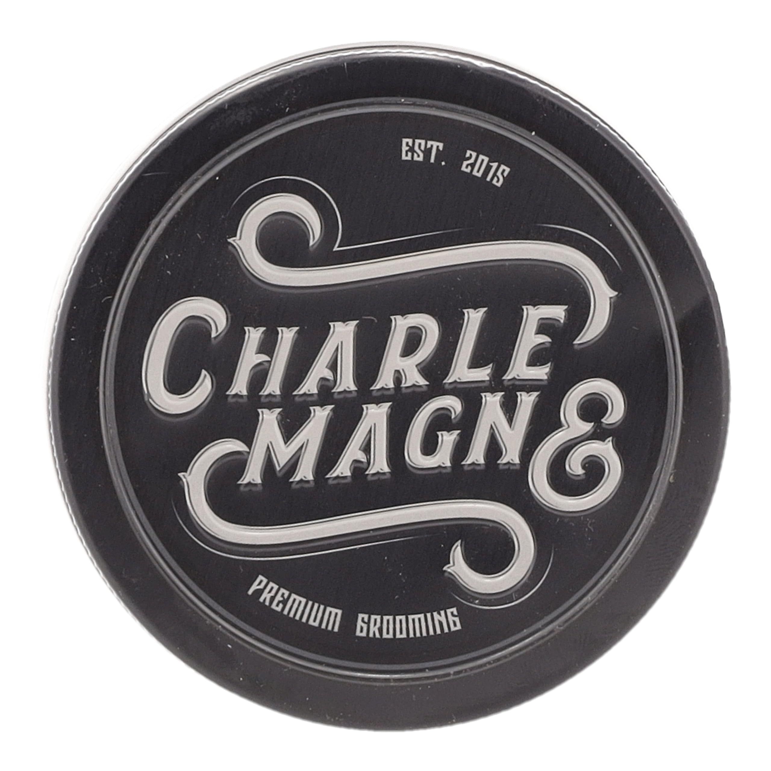 Coperchio nero con scritta argentata "CHARLE MAGN & PREMIUM GROOMING".