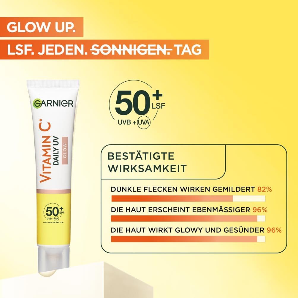 Garnier Vitamin C crema solare. Tubo con SPF 50+. Testo: Efficacia confermata. Riduce le macchie, incarnato uniforme, pelle luminosa.