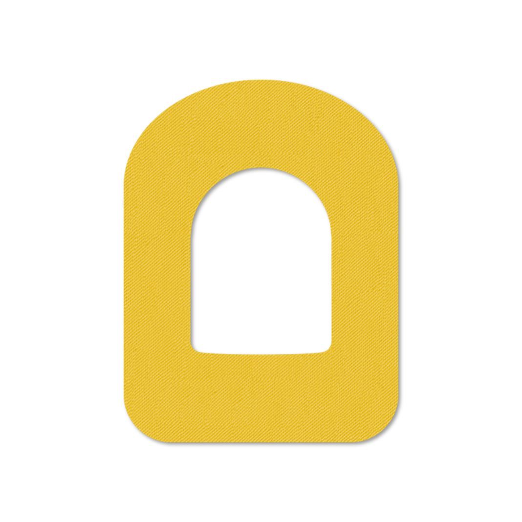 Cerotto giallo ovale con intaglio. Superficie tessile. Angoli arrotondati. Per Omnipod.
