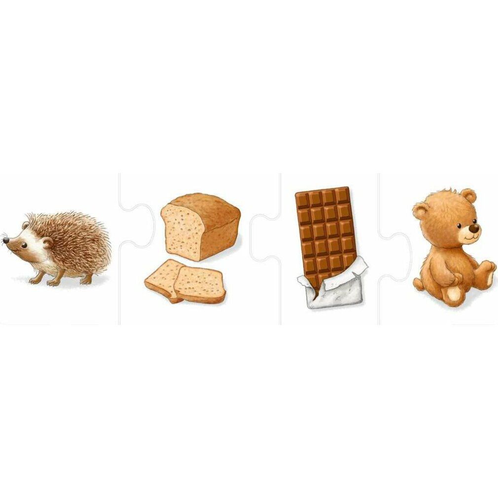 Quattro pezzi di puzzle con motivi: riccio, pane, cioccolato e orsacchiotto. Parte del set di puzzle 'my first color puzzles'.