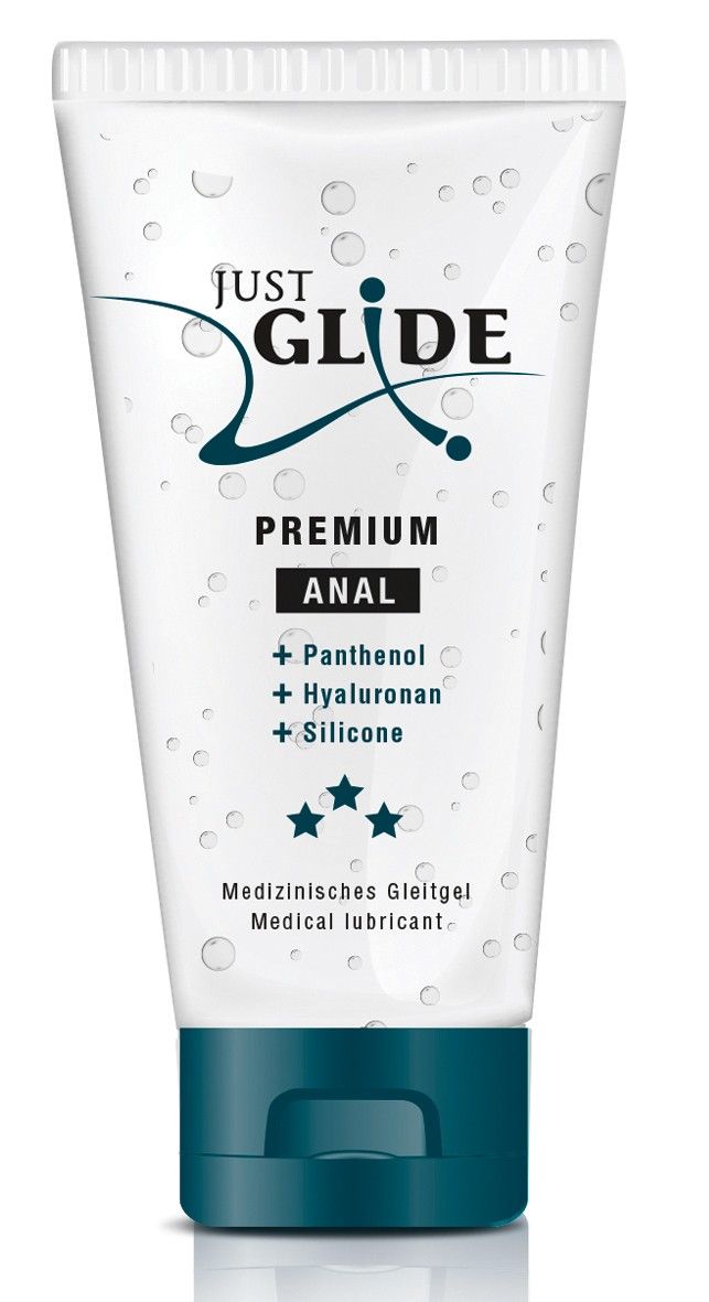 Tubo trasparente con tappo blu. Scritta: Just Glide Premium Anal. Contiene Pantenolo, Ialuronano, Silicone. Gel lubrificante medico.