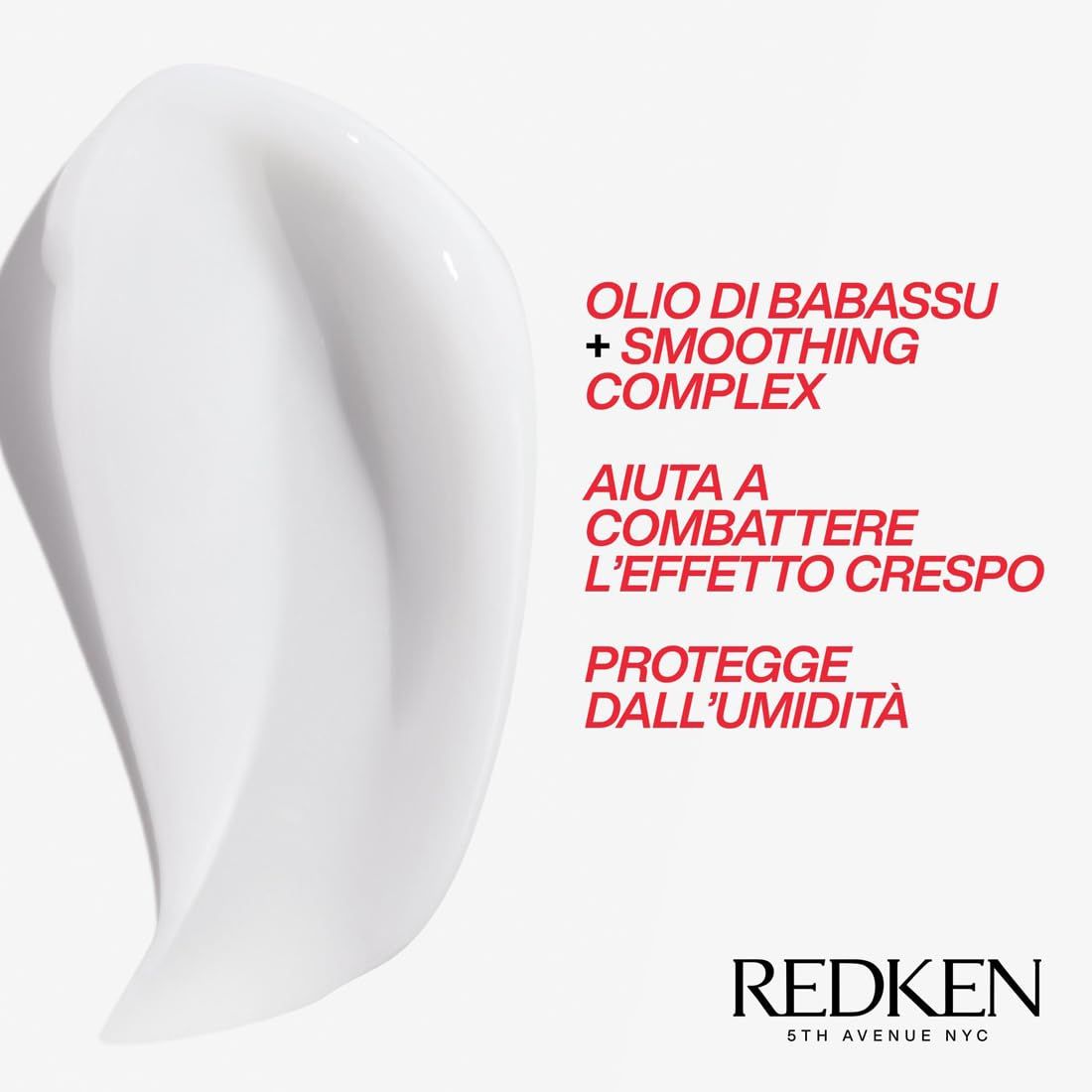 Primo piano di una crema bianca. Testo: Olio di Babassu + Smoothing Complex. Aiuta a combattere l'effetto crespo. Protegge dall'umidità. Redken.