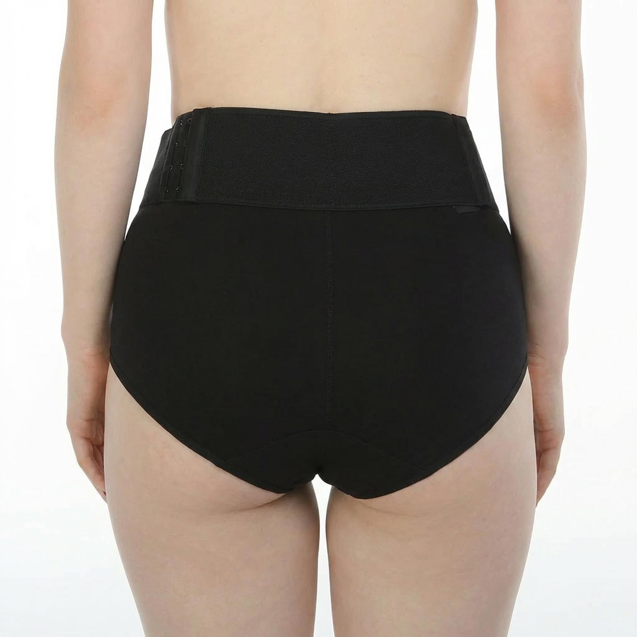 Guaina nera, vista posteriore. Vita alta, superficie liscia.